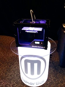 Makerbot Replicator 2 on glowing pedestal